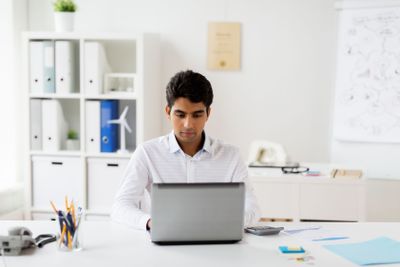 businessman with laptop working at office