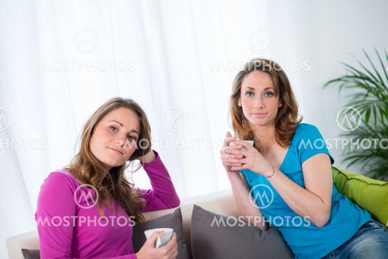 portrait of two beautiful girls at home