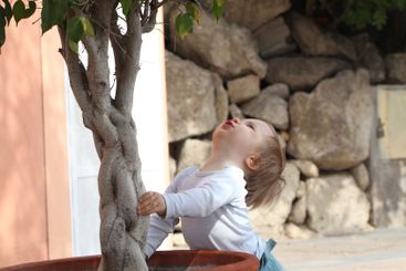 Summer portrait of little child girl outdoors. Childhood