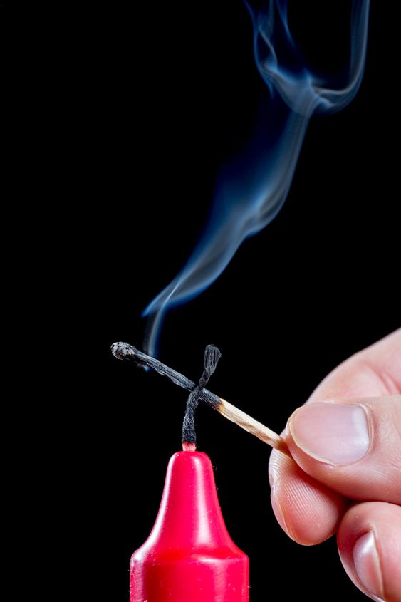 Red Candle Stick With Smoke