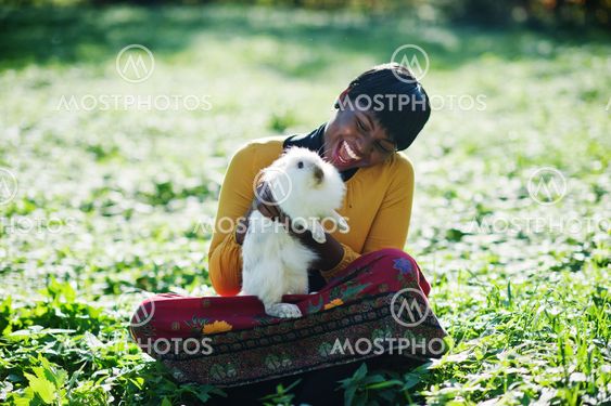 African american girl at yellow and red dress with white...