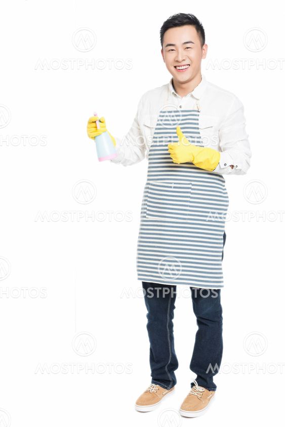 young man cleaning on white