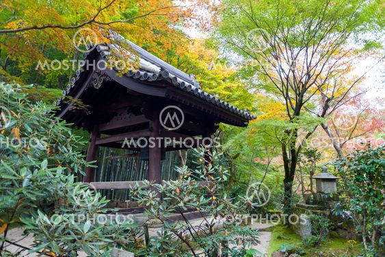 Kyoto, Japan - November 2016: The shoro, shuro or kanetsuki-do, Japanese bell tower or pavilion housing the Buddhist temple's bonsho at Enkoji Temple in Kyoto, Japan, during autumn