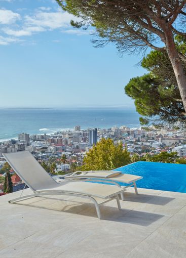 Ocean view, trees and chair with pool for holiday...