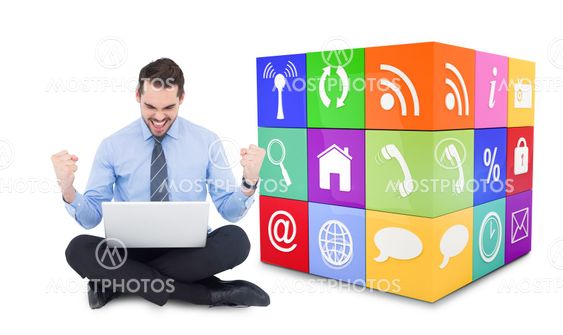 Composite image of businessman sitting with his laptop cheering