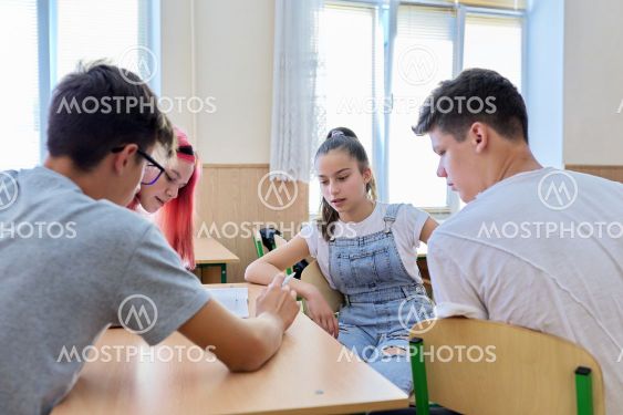 School, education, adolescence. Group of teenage...