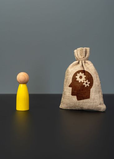 A bag of skills and intellectual abilities and a yellow...