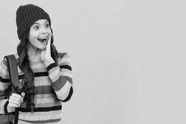 hipster kid with school bag. childhood happiness....