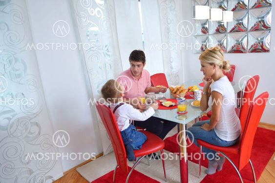 family have healthy breakfast at home