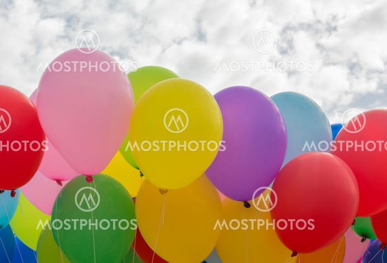 A colorful flying balloon in blue sky