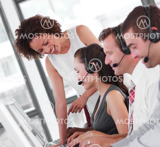 Smiling female manager with her sale representative team