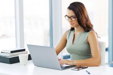 Office, businesswoman and typing with laptop for...