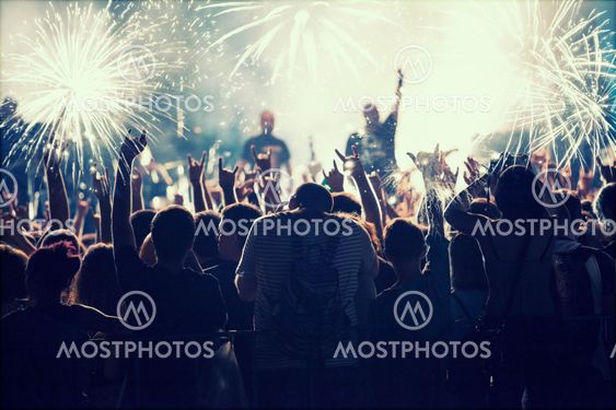 Crowd celebrating with fireworks