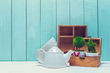 Shabby chic style home decorations on wooden background