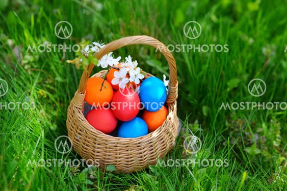 Colorful easter eggs in a basket