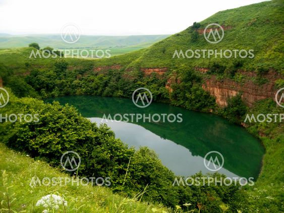 Sarmakovo lake between a caucasus mountains summertime