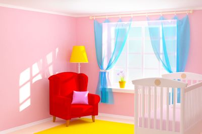 baby room with armchair
