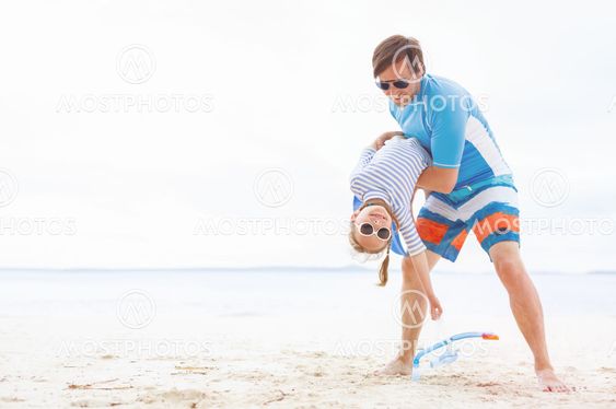 Father and daughter at beach