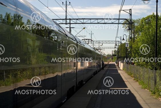 Passagerare vid stationen #13-3