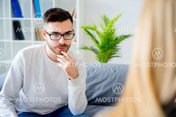 Young man on reception at psychologist