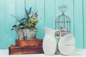 Shabby chic style home decorations on wooden background