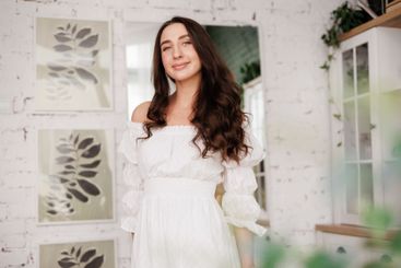 Women's day. Romantic attractive young woman 20-25 years...