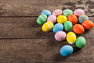 Vintage colorful easter eggs on wood table background