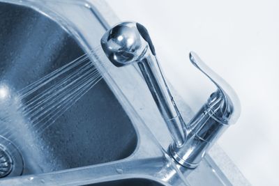 Kitchen Water tap and sink.