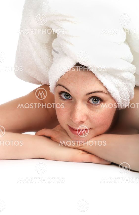 Laying girl in towel