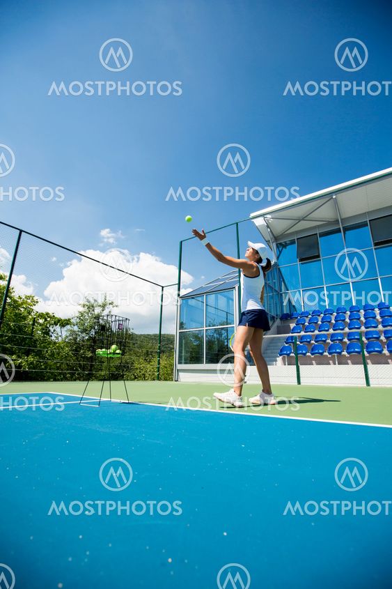 Young woman playing tennis