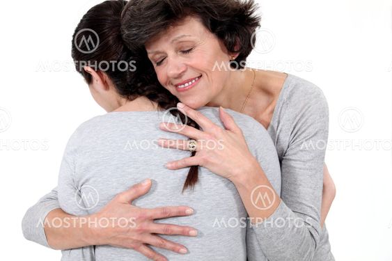 Woman hugging her mother