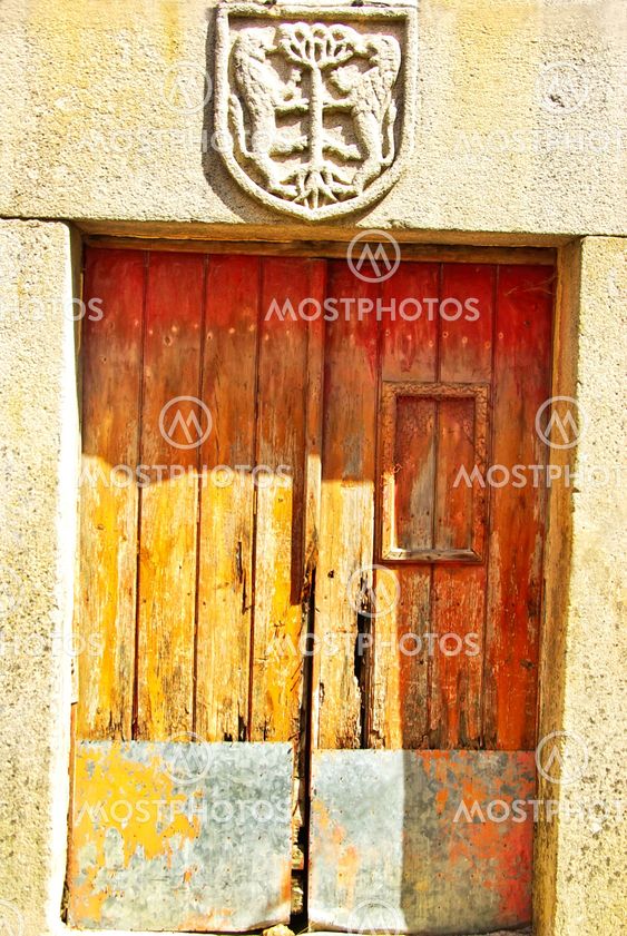 Aged wood door in medieval village,Portugal.