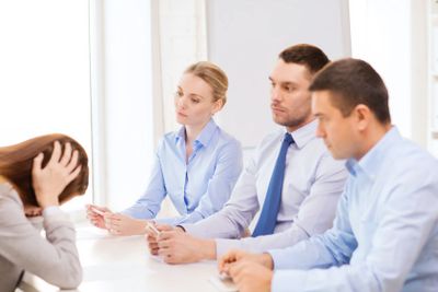 businesswoman getting fired in office