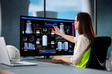 Female Professional Monitoring Energy Production