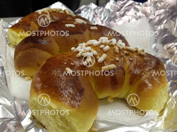 Croissants on sunlit breakfast table