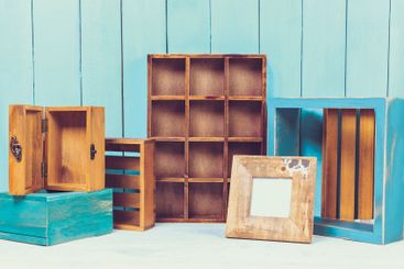 Home decor items on blue wooden background