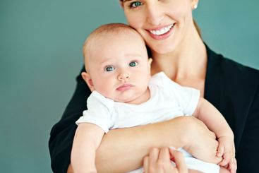 Business woman, baby and mother in studio for...