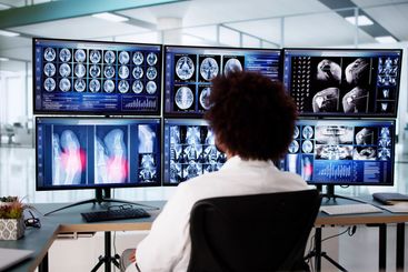 Male doctor using computer