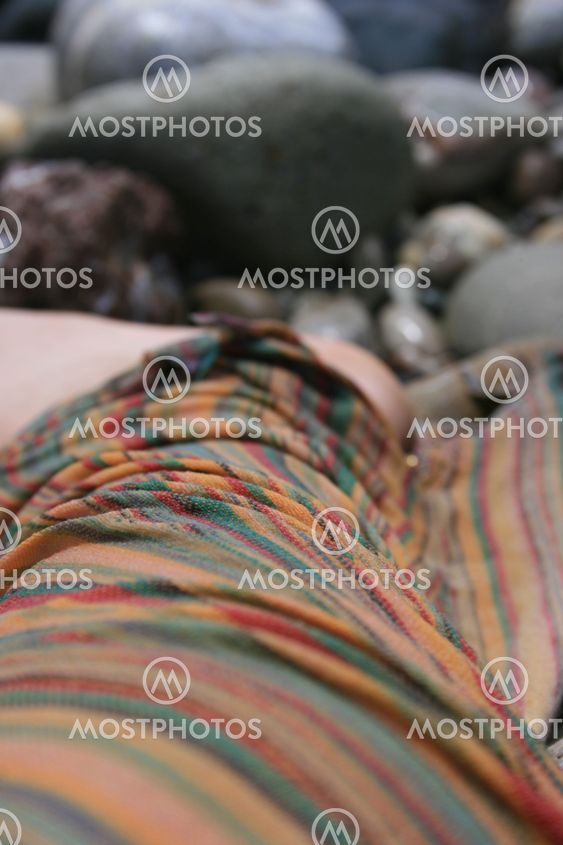 Legs and pebbles