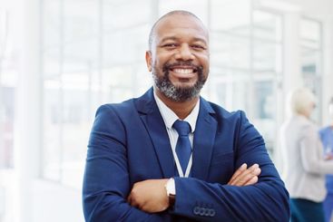 Portrait, business and man in hospital, arms crossed and...