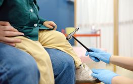 Baby and his mother are being seen by a pediatric...