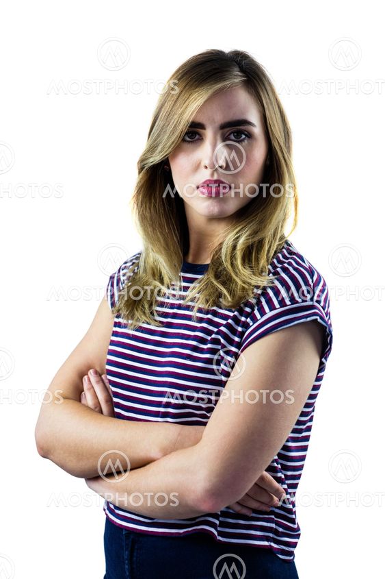 Woman with arms crossed looking at camera