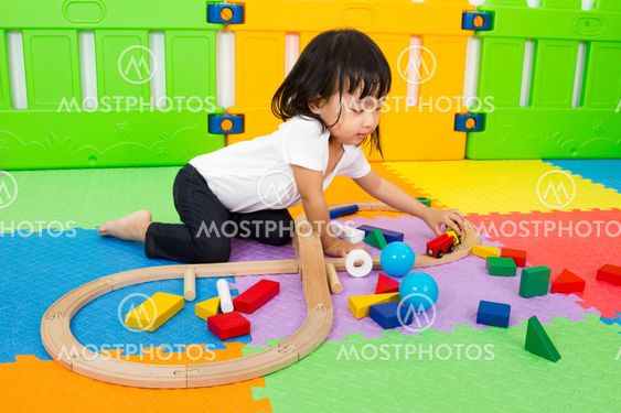 Asian Chinese children playing with blocks