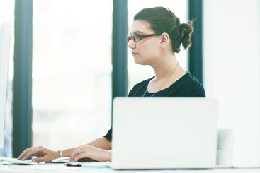 Woman, computer and reporter plan in office,...