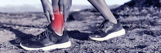 Medical health injury runner woman with hurting twisted...