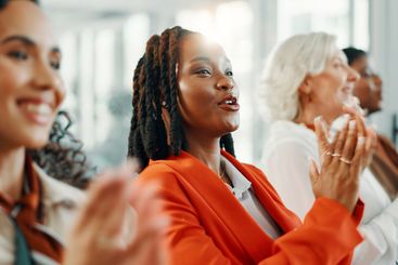 Applause, celebration and meeting with business women in...