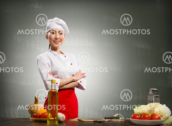 Asian cook woman crossed her arms