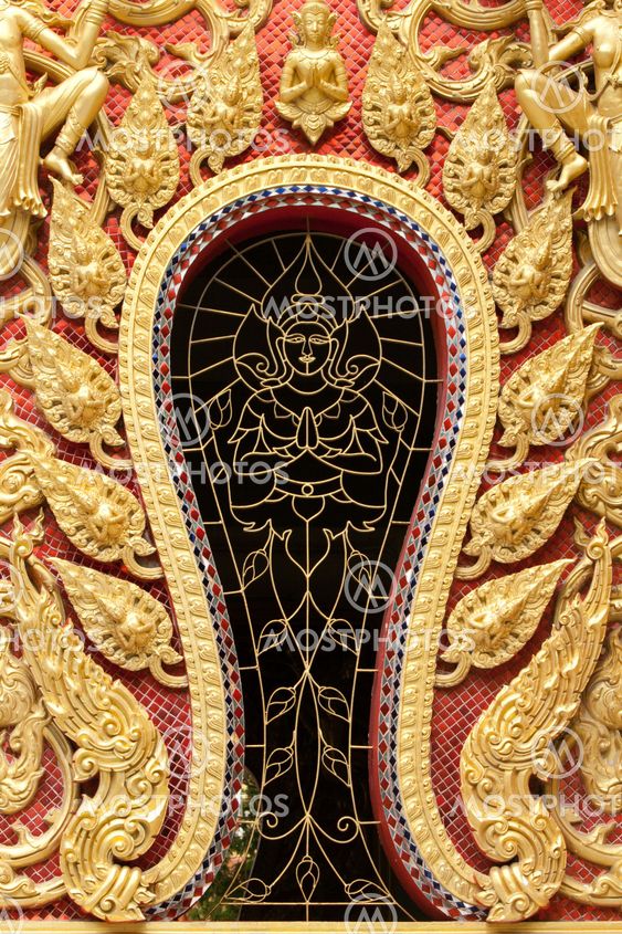 the gold stucco design of native thai style on the Wall