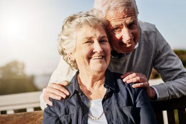 Happy, portrait and senior couple outdoor on balcony for...