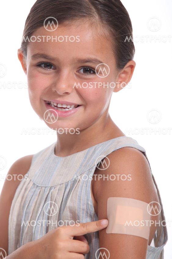 A girl wearing an adhesive bandage